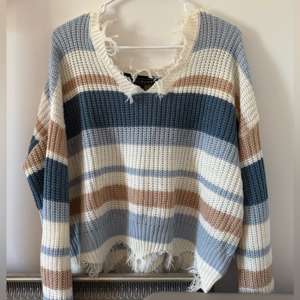Distressed sweater